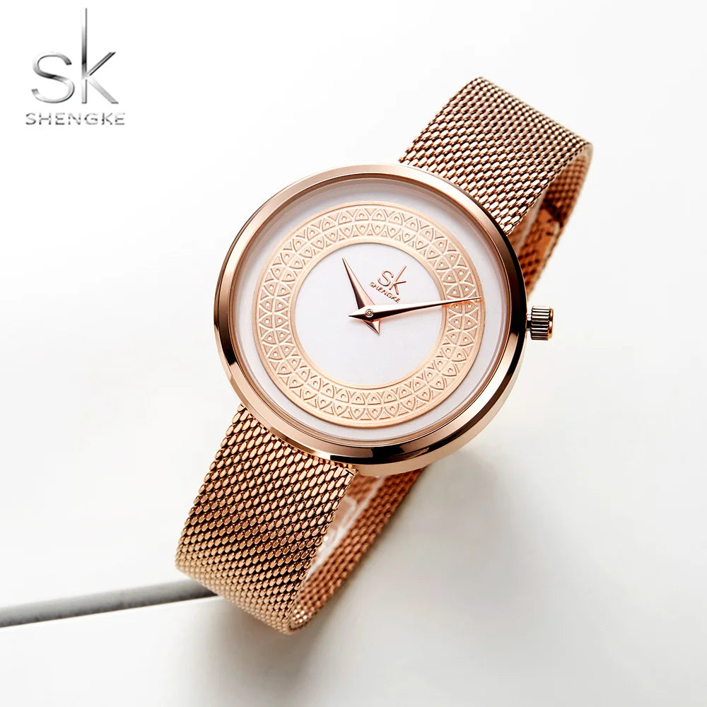 https://ae01.alicdn.com/kf/HTB1ysTjX4_rK1RkHFqDq6yJAFXaT/Shengke-Women-Watches-Women-Fashion-Clock-Vintage-Design-Ladies-Watch-Luxury-Brand-Classical-Gold-Metal-Slice.jpg